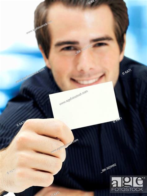 Businessman showing blank business card, Stock Photo, Picture And Royalty Free Image. Pic. IBK ...