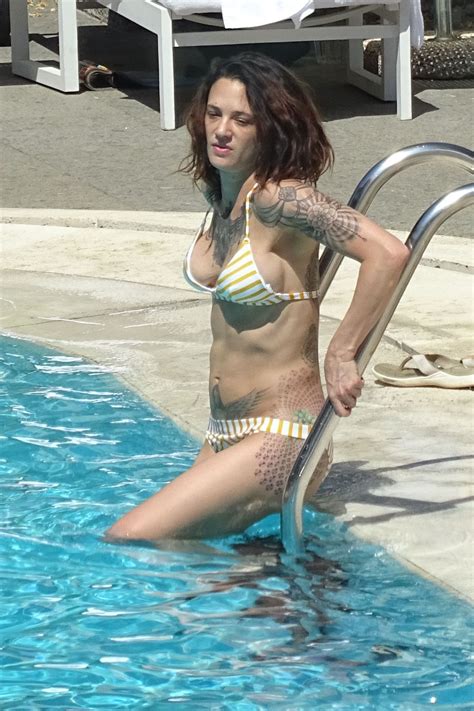 ASIA ARGENTO in Bikini and Anthony Bourdain at a Pool in Rome 09/20/2017 - HawtCelebs