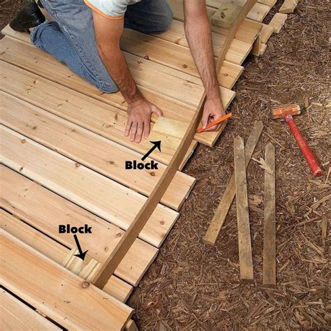 How to Build a Wooden Walkway | Wood walkway, Walkways paths, Garden paths