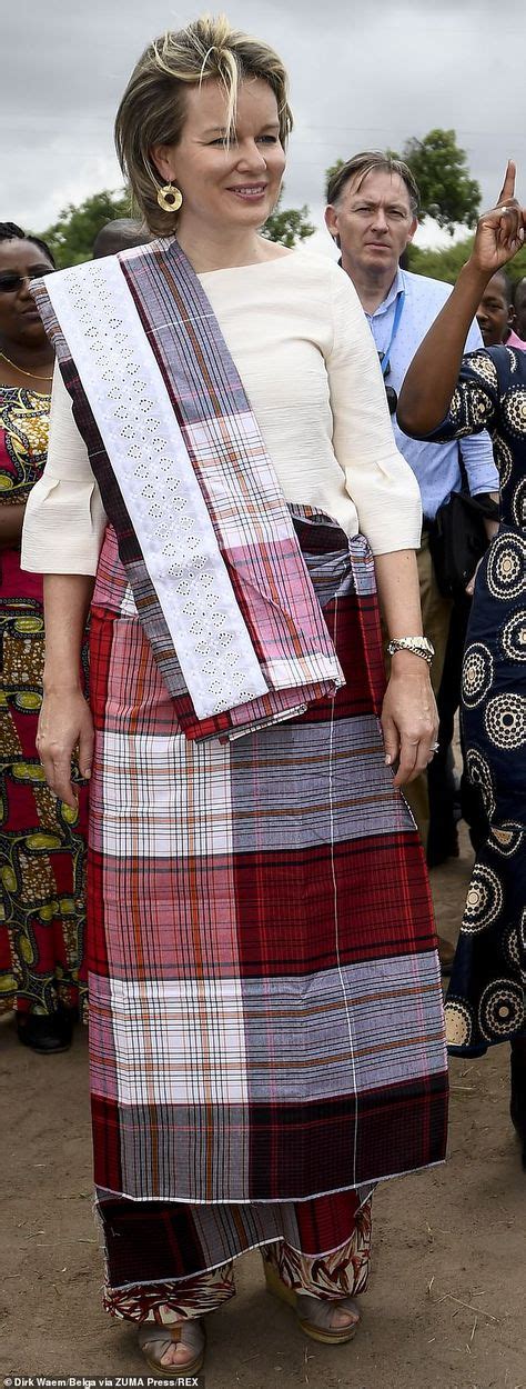 Queen Mathilde welcomes THREE traditional outfit changes in Mozambique ...