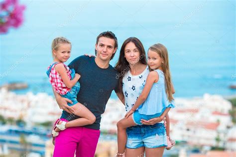 Family on european beach vacation — Stock Photo © d.travnikov #117835886