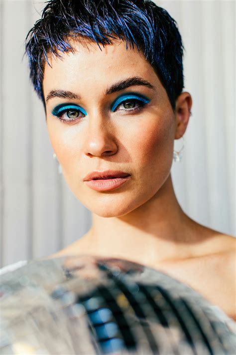 Gentle woman with blue eyeshadow on eyelids · Free Stock Photo