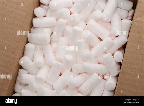 fragment of carton box with white packing foam filling inside Stock ...