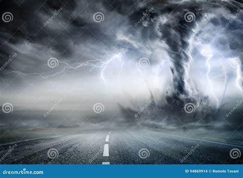 Powerful Tornado on Road stock photo. Image of road, chasing - 94869914