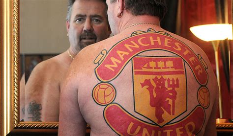 Fan tattoos Manchester United badge on his back | inside World Soccer