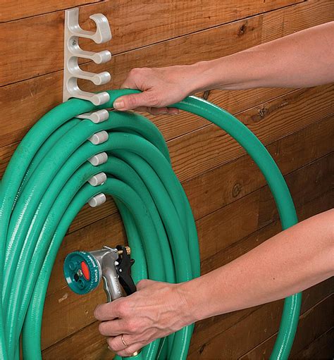 Hose Holder | Garden hose storage, Garden hose holder, Garden tool storage