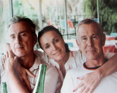 an older man and two younger women are posing for a photo with their ...