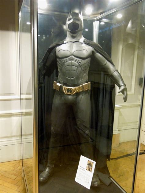 Batman Begins costume worn by Christian Bale on display... | Hollywood Movie Costumes