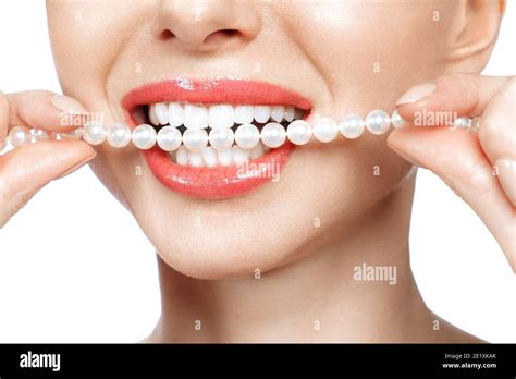 Beautiful female teeth smile and pearl necklace, Dental Health Concept ...