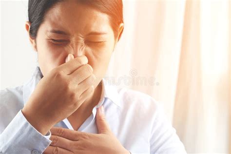 A Foul Smell when Breathing May Be Caused Stock Photo - Image of ...