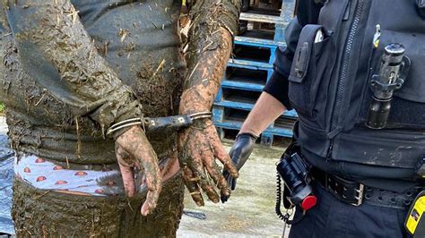 Suspect arrested after ending up 'neck-deep' in slurry pit during police chase | UK News | Sky News