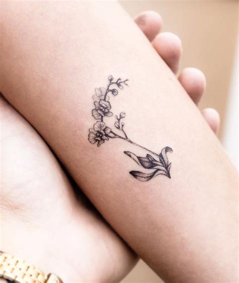 orchid tattoos on wrist - ap-style-song-titles