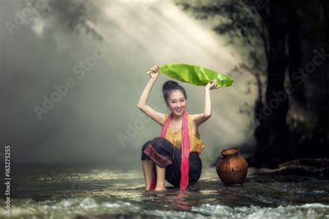 "Lao girls are enjoying swimming in Asian rivers." Stock photo and royalty-free images on ...