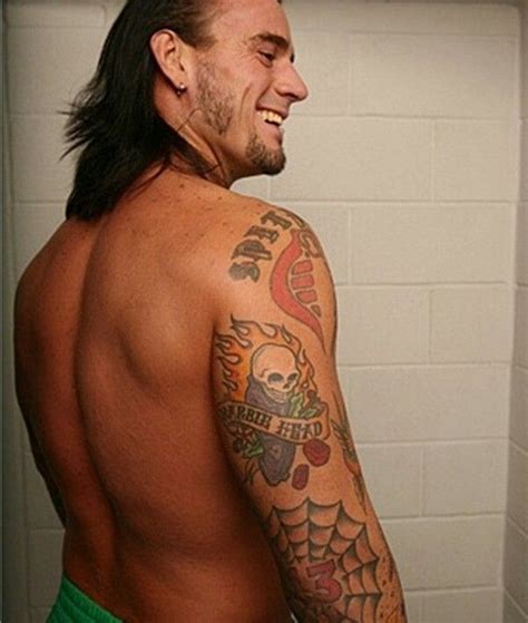 skull tattoos from tattooton.com | Cm punk tattoos, Cm punk, Cm punk aj lee