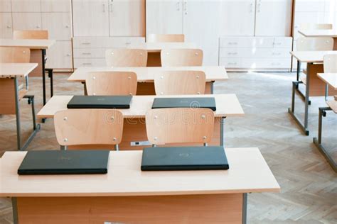 Empty Classroom with Laptops on Desk Stock Photo - Image of desk, desks ...