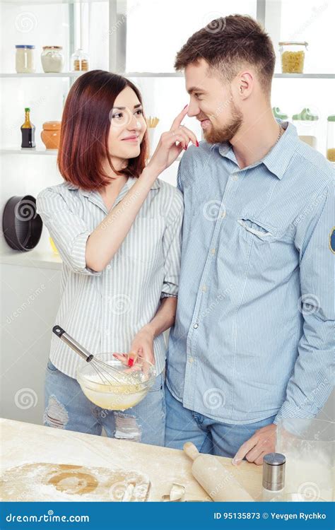 Funny Couple in Love Cooking Dough and Having Fun with Flour in Kitchen ...