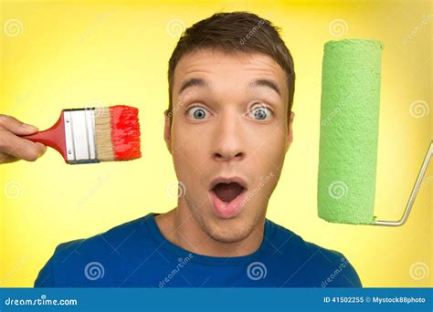 Handsome Man with Paint Brush and Roller. Stock Image - Image of craft, paintbrush: 41502255