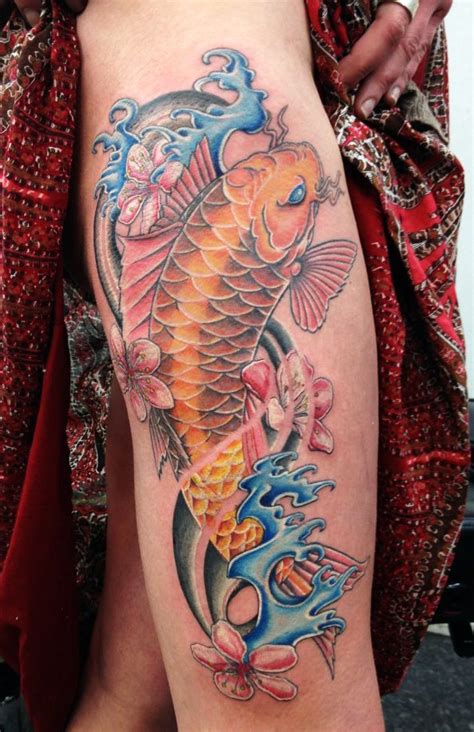 Lovely gold koi fish tattoo - Tattooimages.biz