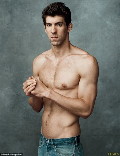 Michael Phelps strips down to show off his swimmer's body as he gets set for the Olympics ...