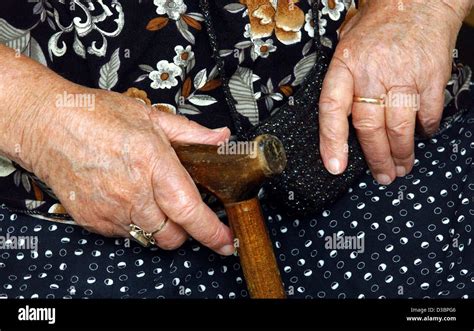 Old lady walking stick hi-res stock photography and images - Alamy