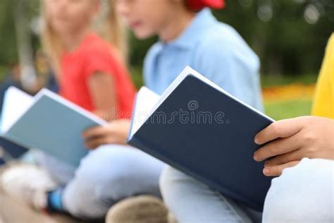 Little Children Reading Books Outdoors Stock Image - Image of kids ...