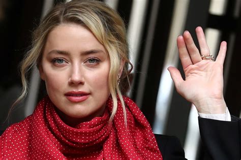 Amber Heard left with 'scars' on arms after Johnny Depp abuse: pal