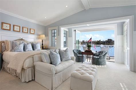 mmm comfy and cozy big white and blue bedroom overlooking the water ...