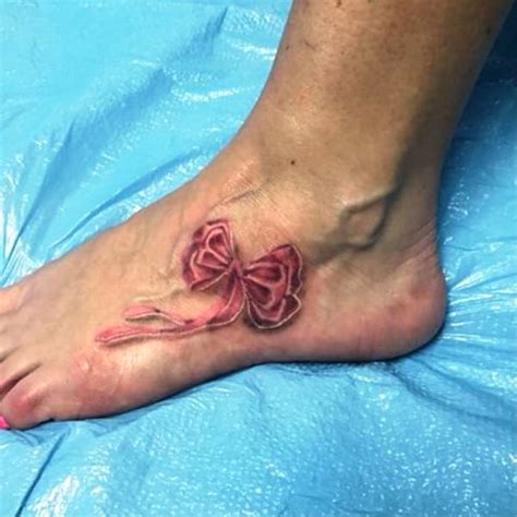 40 Incredible Bow Foot Tattoo Pictures