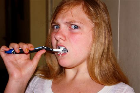 File:Annoyed Girl Brushing Teeth.jpg - Wikimedia Commons