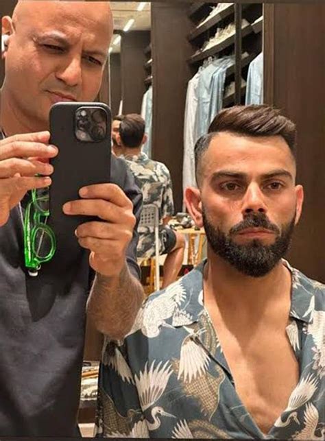 Virat Kohli shows off his new hairstyle done by Aalim Hakim during RCB ...