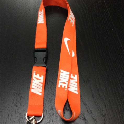 Nike Lanyard Orange With White Logo | Nike lanyard, Lanyard, Nike