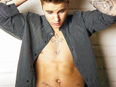 Justin Bieber Tattoo Guide & Meanings