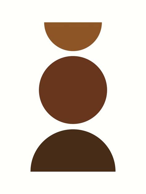 three brown circles on top of each other in the shape of a person's head