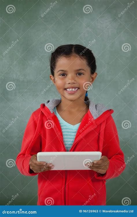 Young Girl Holding Digital Tablet Stock Image - Image of homework, lesson: 96126963