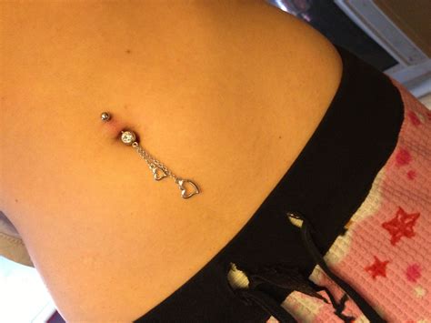 dangly heart naval piercing | Belly button piercing jewelry, Bellybutton piercings, Piercing tattoo