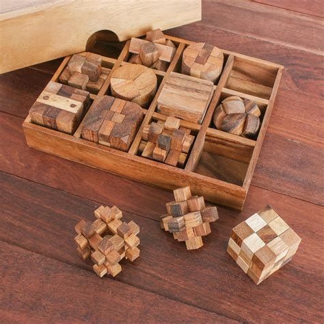 12 Handcrafted Wood Puzzles with Box from Thailand - Array of Challenges | NOVICA