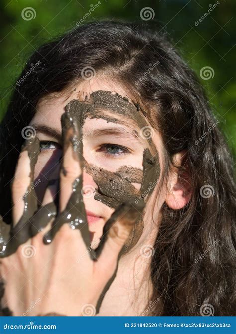 Muddy Face of a Young Woman Stock Photo - Image of contest, face: 221842520