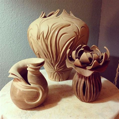 beautiful carved pottery flowing lines and curves, nouveau organic style. Does anyone know the ...