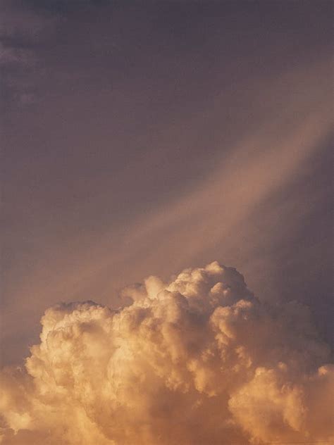 Fluffy Cloud on a Sunset Sky · Free Stock Photo