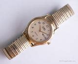 Vintage Elegant Timex Indiglo Watch | Gold-tone Timex Date Watch – Vintage Radar
