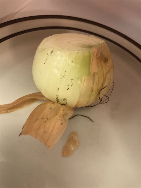 Yes, the black, sooty stuff on onions is mold -- but don't panic