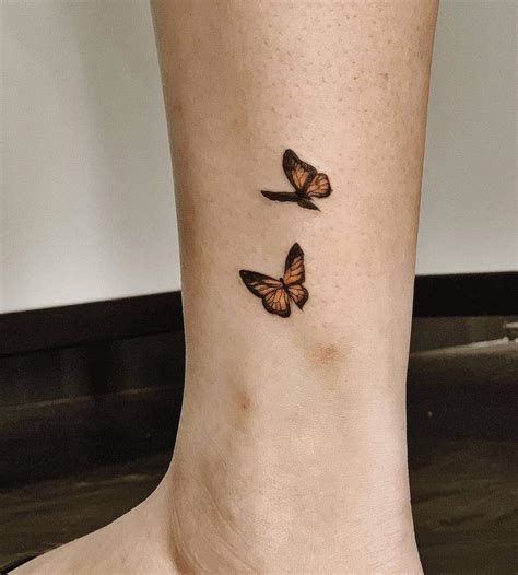 Small Monarch Butterfly Tattoo