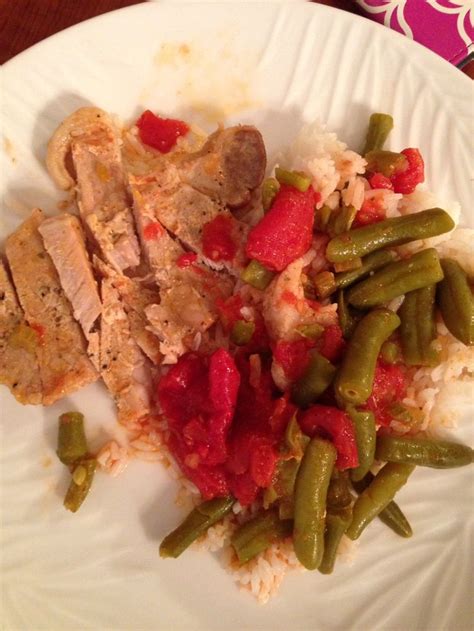 Boneless pork chops, stewed tomatoes, green beans and rice. Yum ...