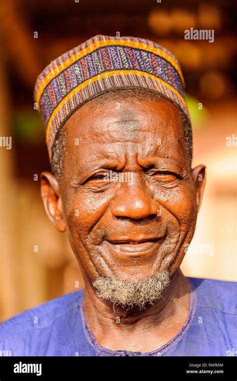 PORTO-NOVO, BENIN - MAR 8, 2012: Portrait of Unidentified Beninese old man smiling in a typical ...
