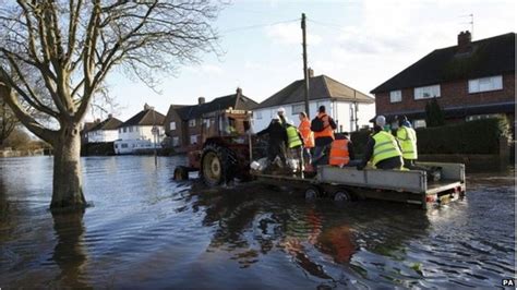 Surrey flood victims' council tax waived - BBC News