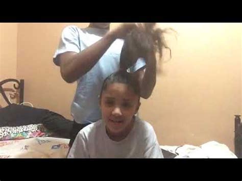 Doing my cousin hair - YouTube