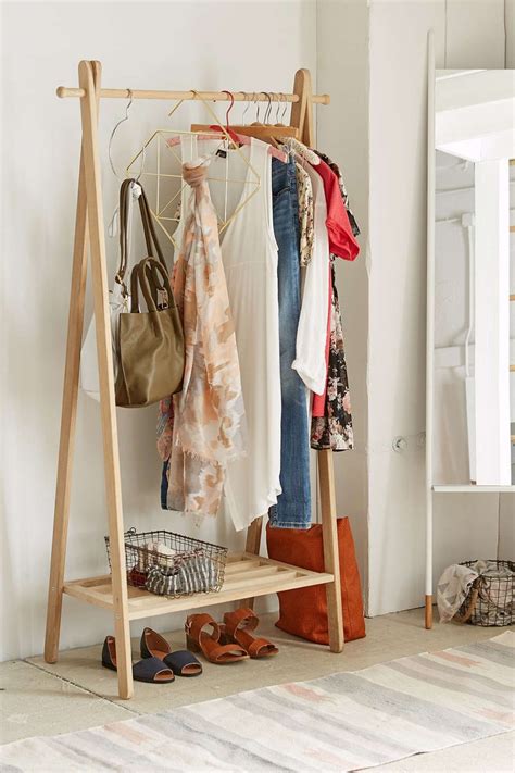 Wooden Clothing Rack - Urban Outfitters #UOonCampus | Wood clothing rack, Clothing rack, Wood ...