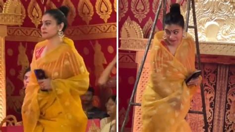 Kajol looks radiant in yellow saree as she attends Durga Puja pandal ...