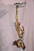 Bronze floor lamp of a woman holding leaf; 68-4418 - R.H. Lee & Co. Auctioneers