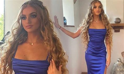 Princess Andre, 15, cuts a glamorous figure in a blue satin dress as she heads to prom with her ...